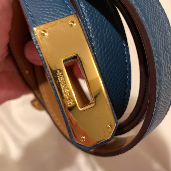 Brand new thin trendy navy belt , adjustable size L 30 . Never been worn…